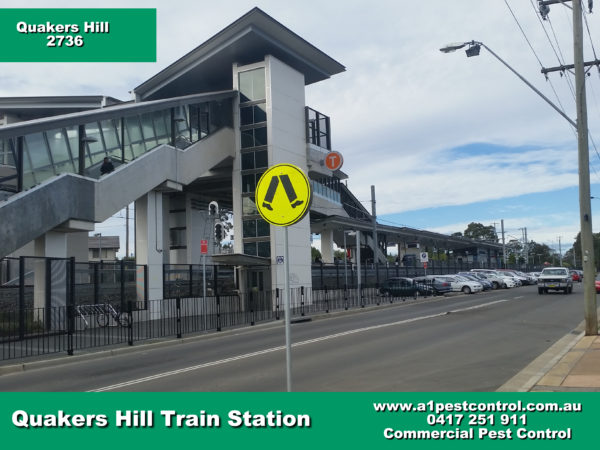 Picture of Quakers Hill Train Station taken from across the street facing the station.