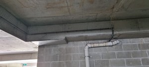 bird spikes on pipes with droppings