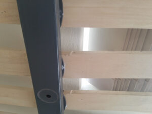 Bed slats with bed bug droppings 3