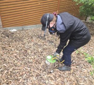 Lisa From A1 Pest Control Preparing to Spray Castle Hill Unit